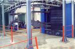 Cogeim Continuous feed  pass-through  hanging load type shot blasting machine - GTU Series Shotblasting Machines 